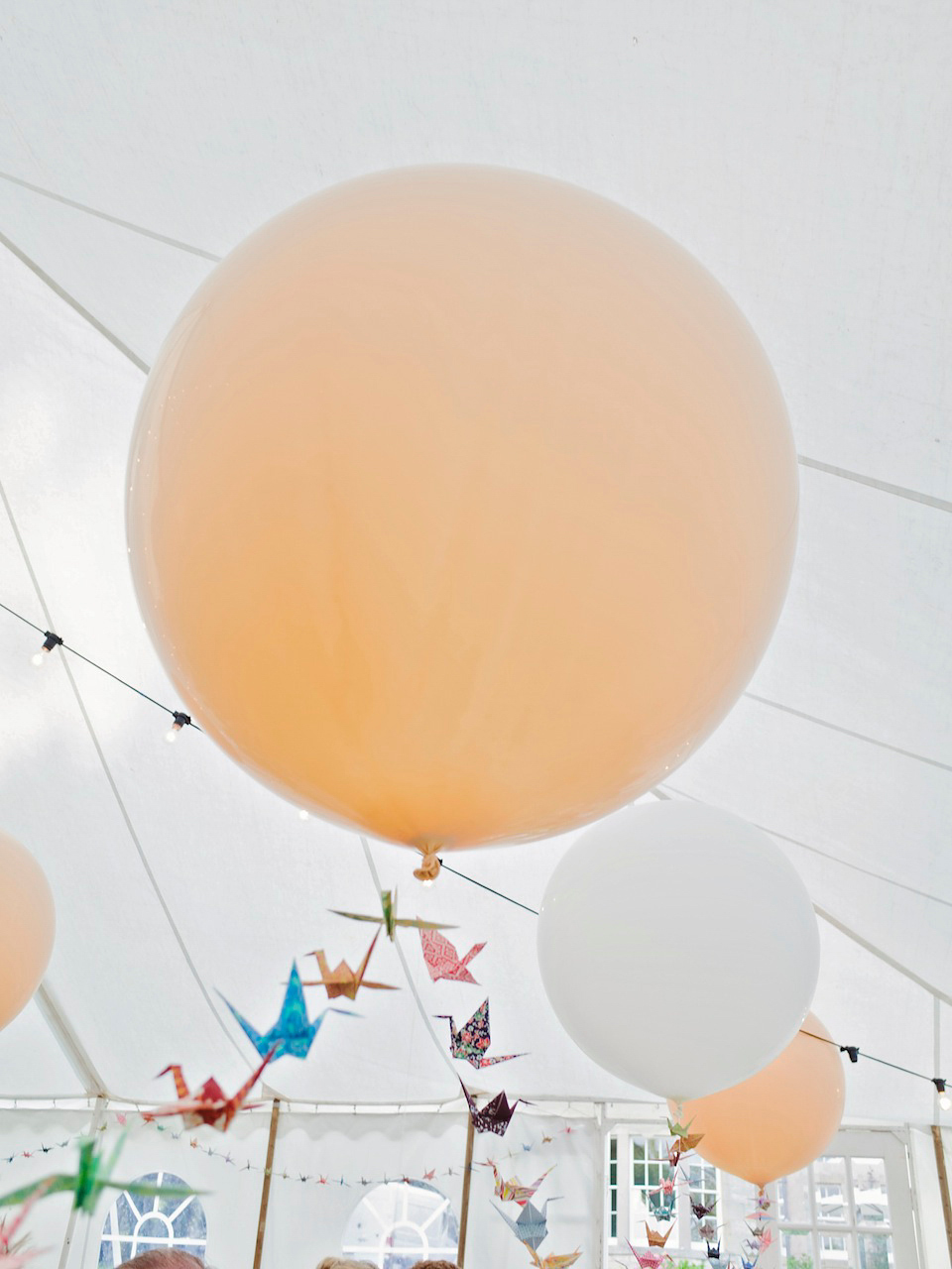 Bride Amy wears a Belle & Bunty Gown for her pretty rustic wedding with 1000 paper cranes. She and her husband David met via the Guardian Soulmates online dating site.