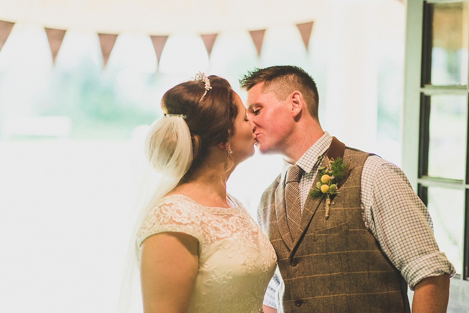 A bright and colourful, English country wedding held in the open air at a moated Tudor Hall. Photography by Matt Penberthy.