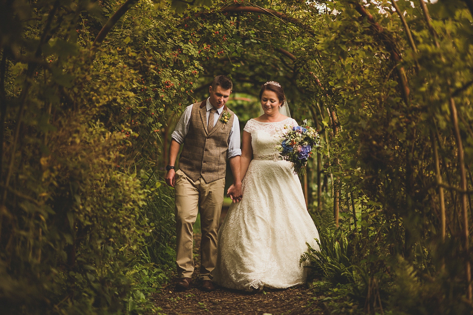 A bright and colourful, English country wedding held in the open air at a moated Tudor Hall. Photography by Matt Penberthy.