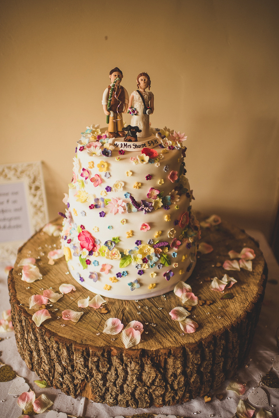 A bright and colourful, English country wedding held in the open air at a moated Tudor Hall. Photography by Matt Penberthy.