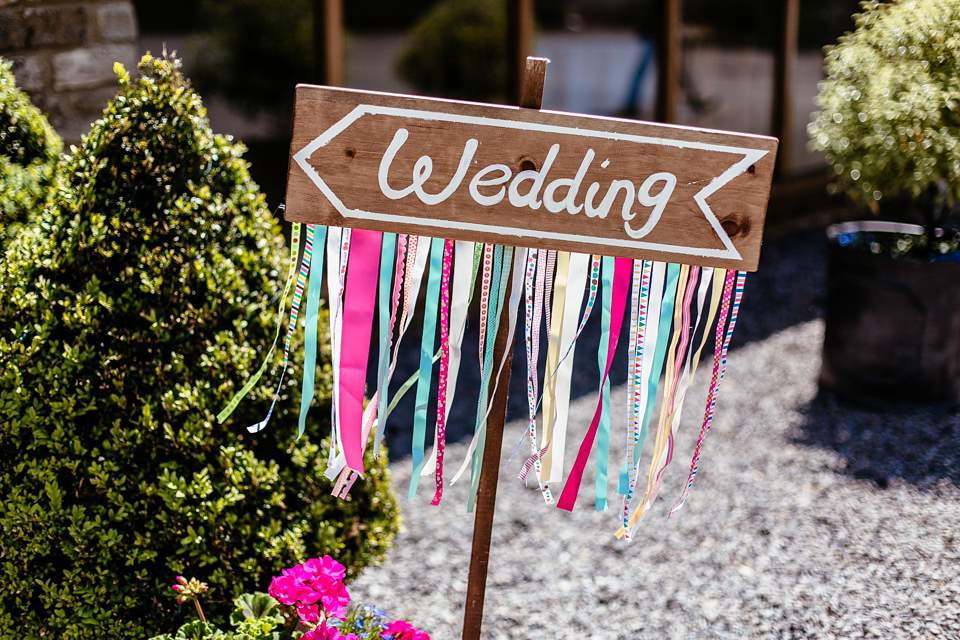 Lucy wore an Ellis Bridals gown for her quirky and colourful outdoor wedding. Photography by Cassandra Lane.