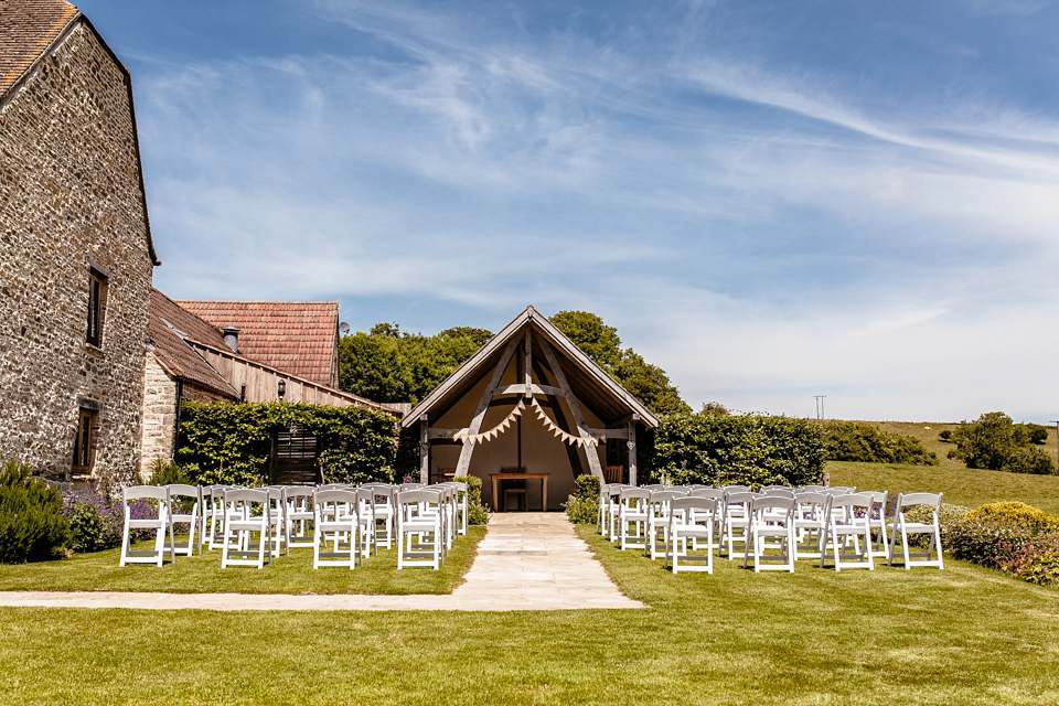 Lucy wore an Ellis Bridals gown for her quirky and colourful outdoor wedding. Photography by Cassandra Lane.