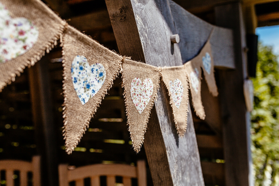 Lucy wore an Ellis Bridals gown for her quirky and colourful outdoor wedding. Photography by Cassandra Lane.