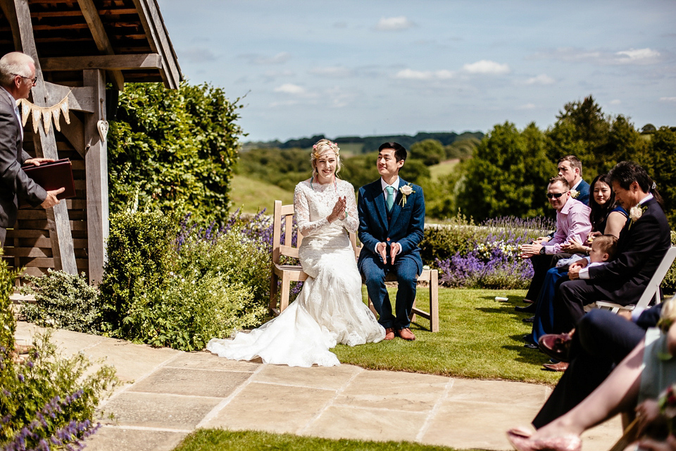 Lucy wore an Ellis Bridals gown for her quirky and colourful outdoor wedding. Photography by Cassandra Lane.