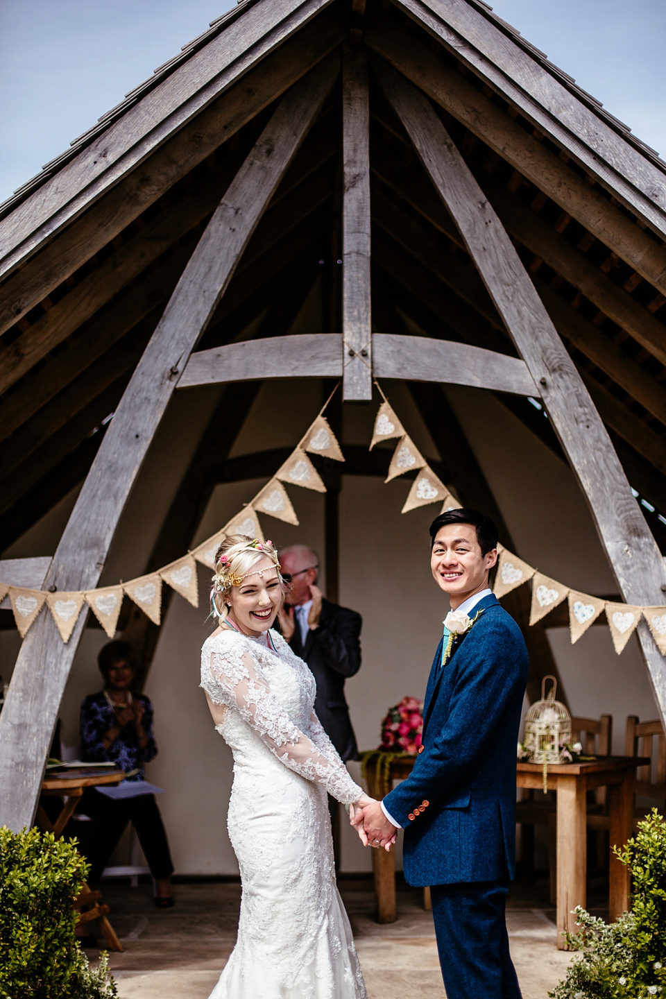 Lucy wore an Ellis Bridals gown for her quirky and colourful outdoor wedding. Photography by Cassandra Lane.