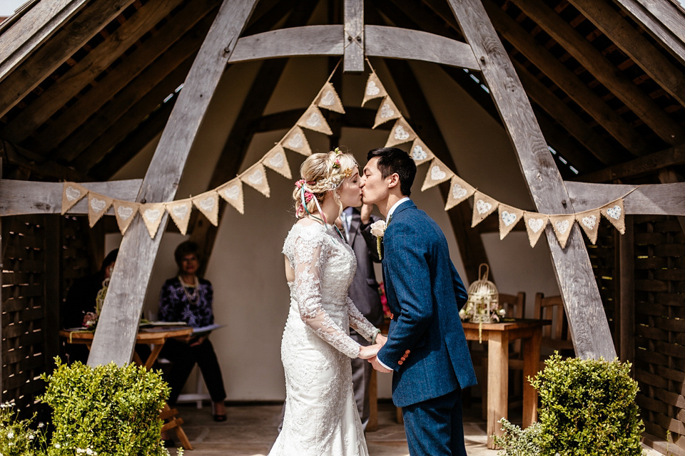 Lucy wore an Ellis Bridals gown for her quirky and colourful outdoor wedding. Photography by Cassandra Lane.