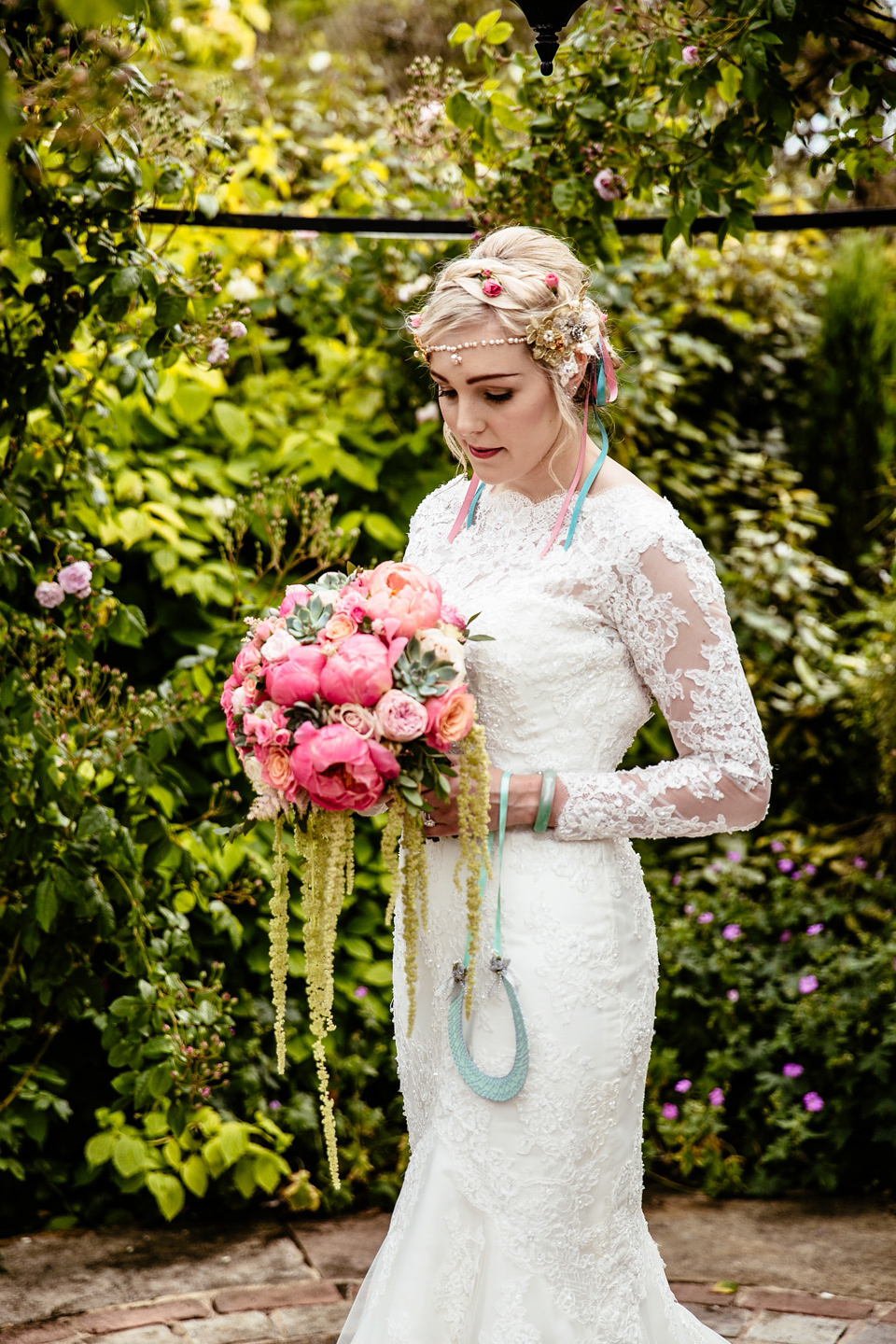 Lucy wore an Ellis Bridals gown for her quirky and colourful outdoor wedding. Photography by Cassandra Lane.