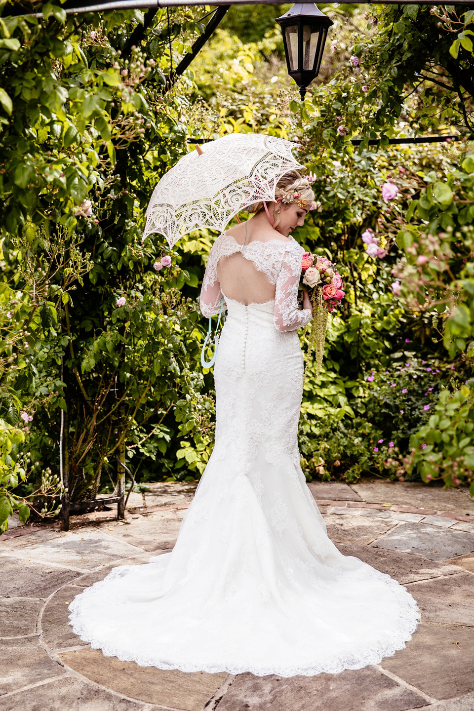 Lucy wore an Ellis Bridals gown for her quirky and colourful outdoor wedding. Photography by Cassandra Lane.