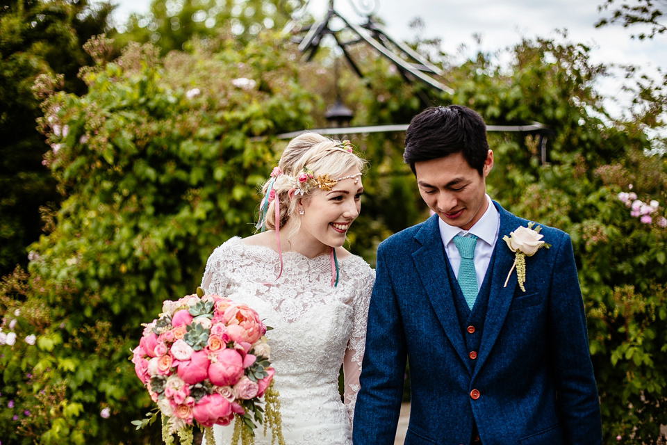 Lucy wore an Ellis Bridals gown for her quirky and colourful outdoor wedding. Photography by Cassandra Lane.