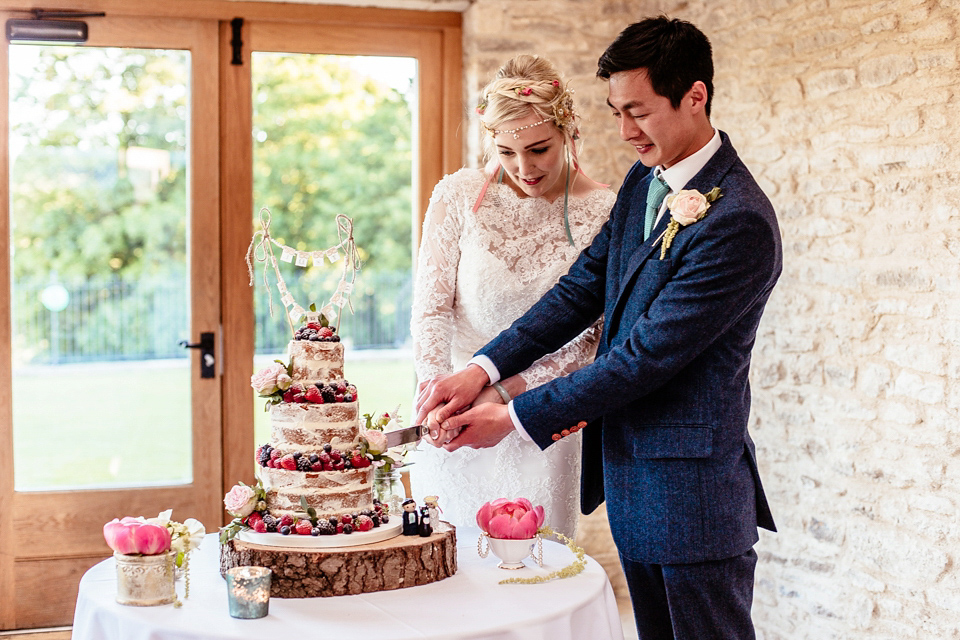 Lucy wore an Ellis Bridals gown for her quirky and colourful outdoor wedding. Photography by Cassandra Lane.