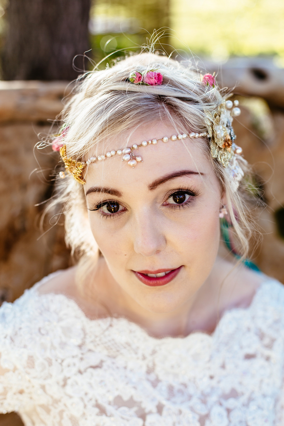 Lucy wore an Ellis Bridals gown for her quirky and colourful outdoor wedding. Photography by Cassandra Lane.