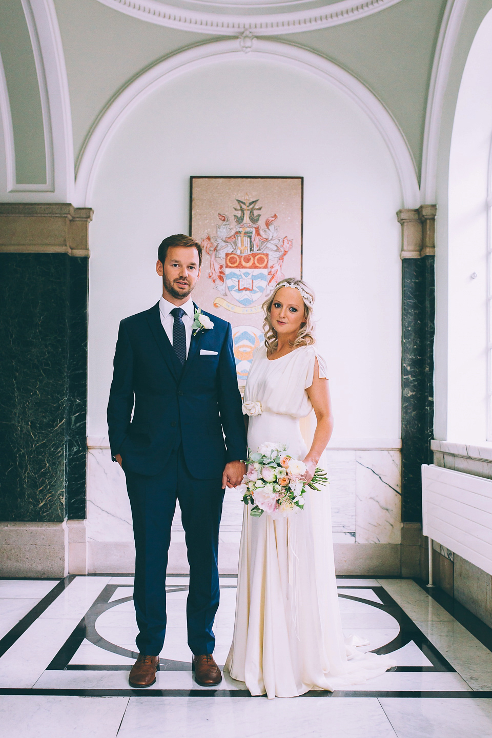 Bride Rosie wore a Belle & Bunty gown for her city wedding. Photography by Tom Biddle.