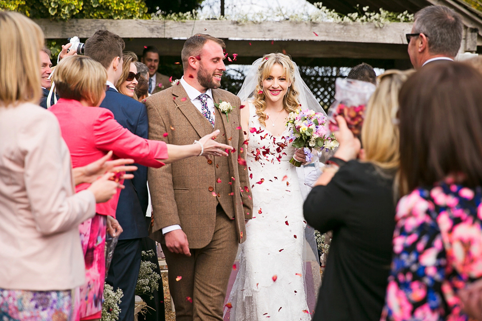 Bride Chloe wore a Cymbeline gown for her Spring wedding  at Swallow's Oast in Sussex. Photography by Rachael Edwards.