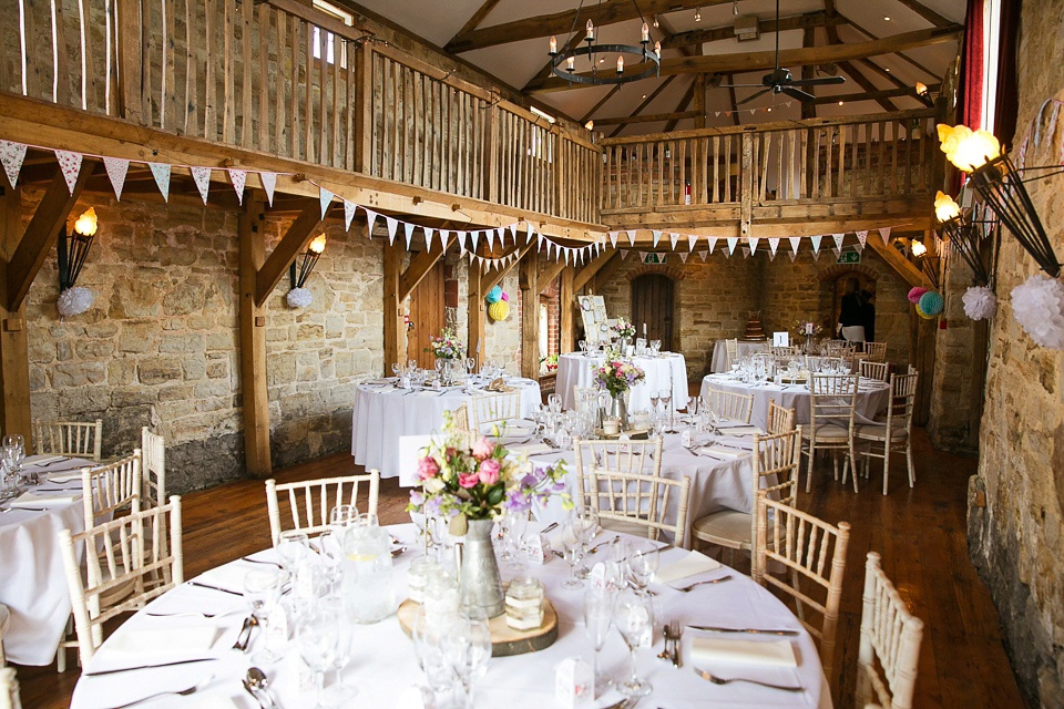 Bride Chloe wore a Cymbeline gown for her Spring wedding  at Swallow's Oast in Sussex. Photography by Rachael Edwards.