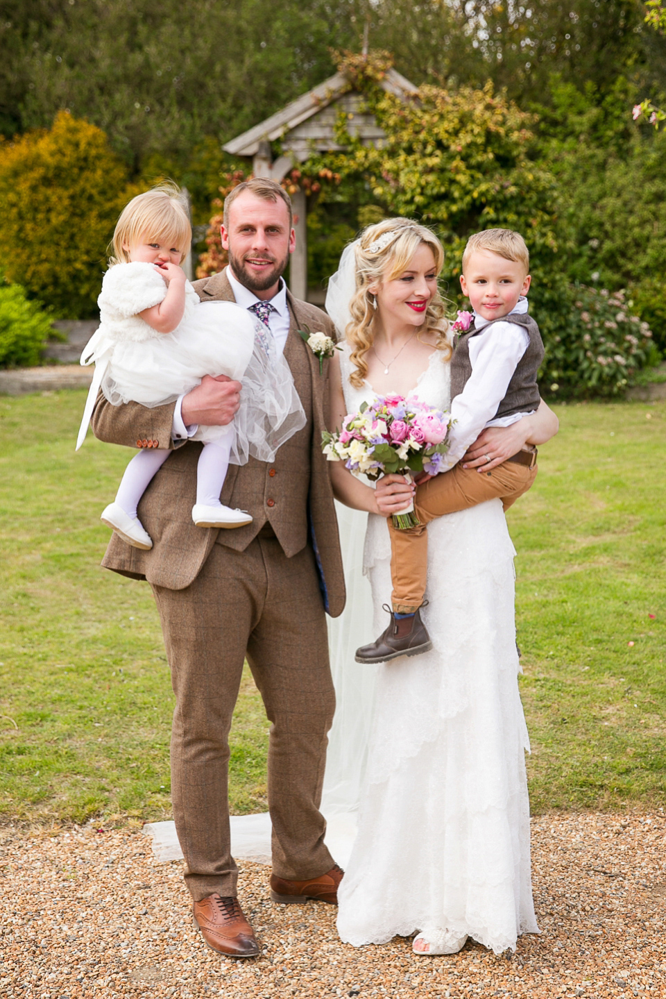 Bride Chloe wore a Cymbeline gown for her Spring wedding  at Swallow's Oast in Sussex. Photography by Rachael Edwards.