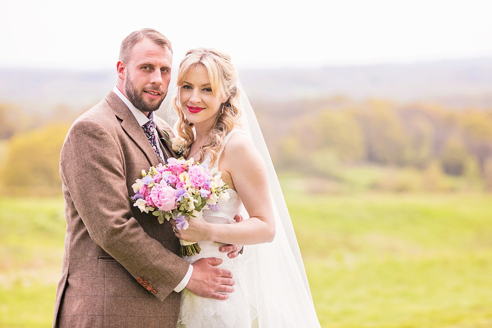 Bride Chloe wore a Cymbeline gown for her Spring wedding  at Swallow's Oast in Sussex. Photography by Rachael Edwards.