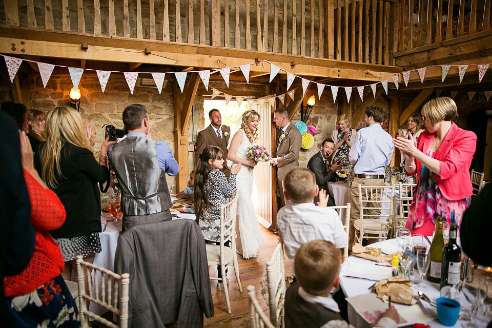 Bride Chloe wore a Cymbeline gown for her Spring wedding  at Swallow's Oast in Sussex. Photography by Rachael Edwards.