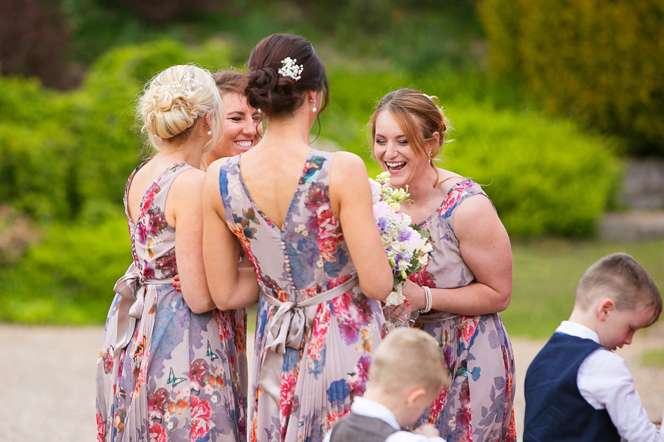 Bride Chloe wore a Cymbeline gown for her Spring wedding  at Swallow's Oast in Sussex. Photography by Rachael Edwards.