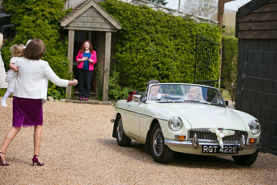 Bride Chloe wore a Cymbeline gown for her Spring wedding  at Swallow's Oast in Sussex. Photography by Rachael Edwards.