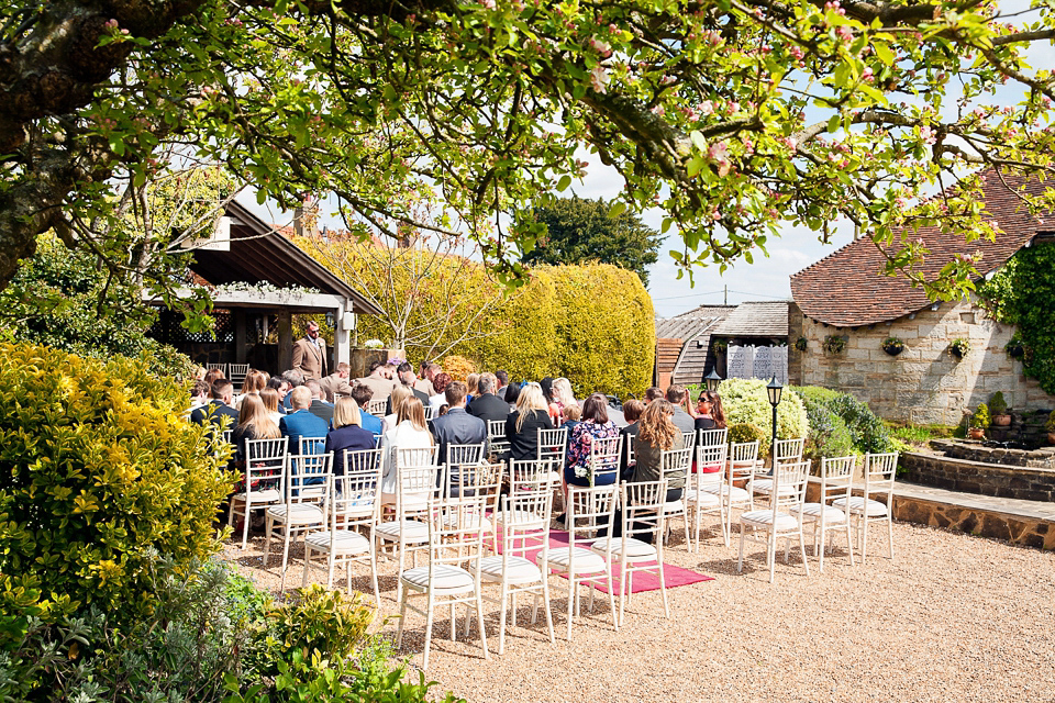 Bride Chloe wore a Cymbeline gown for her Spring wedding  at Swallow's Oast in Sussex. Photography by Rachael Edwards.