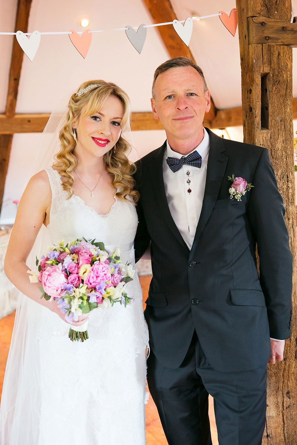 Bride Chloe wore a Cymbeline gown for her Spring wedding  at Swallow's Oast in Sussex. Photography by Rachael Edwards.