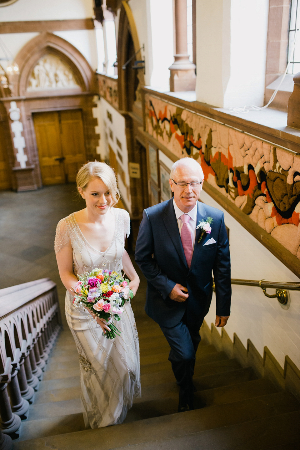 Kat wears Eden by Jenny Packham for her pretty Summer village hall wedding. Photography by Emma B.