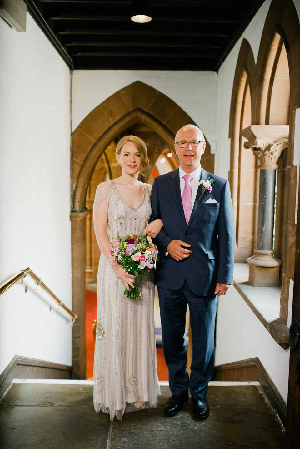 Kat wears Eden by Jenny Packham for her pretty Summer village hall wedding. Photography by Emma B.