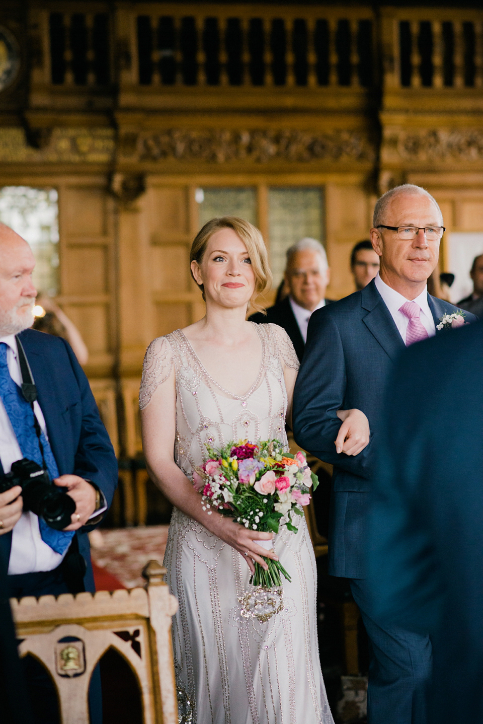 Kat wears Eden by Jenny Packham for her pretty Summer village hall wedding. Photography by Emma B.