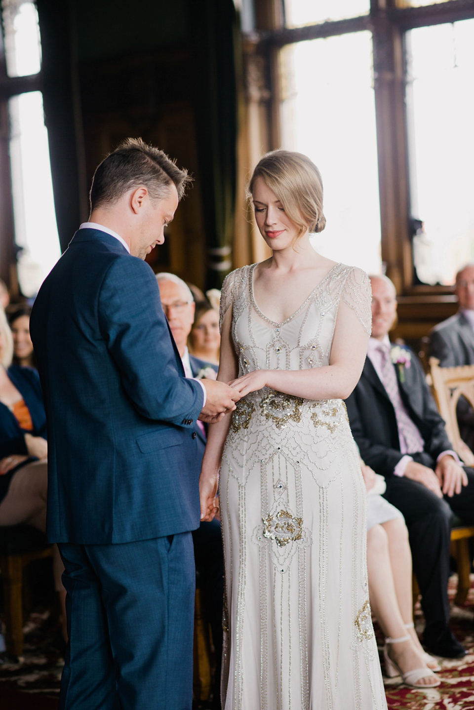 Kat wears Eden by Jenny Packham for her pretty Summer village hall wedding. Photography by Emma B.