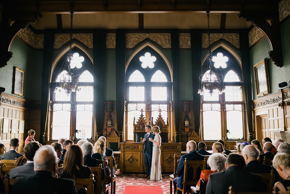 Kat wears Eden by Jenny Packham for her pretty Summer village hall wedding. Photography by Emma B.