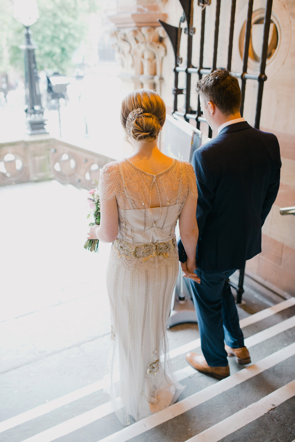 Kat wears Eden by Jenny Packham for her pretty Summer village hall wedding. Photography by Emma B.