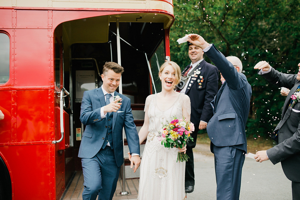 Kat wears Eden by Jenny Packham for her pretty Summer village hall wedding. Photography by Emma B.