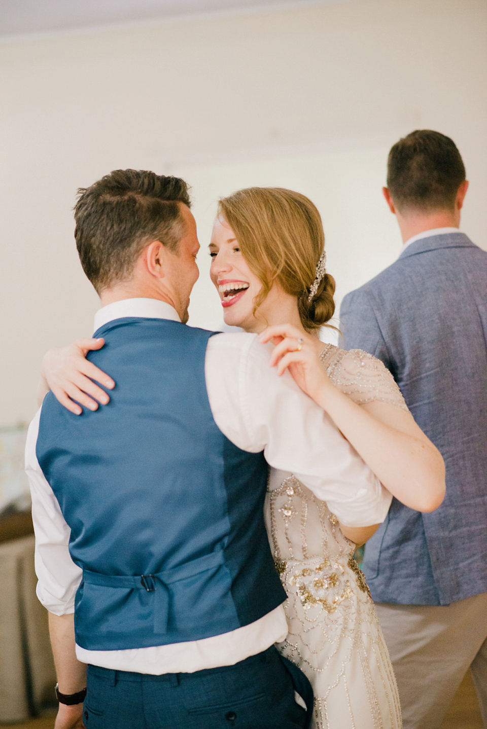 Kat wears Eden by Jenny Packham for her pretty Summer village hall wedding. Photography by Emma B.