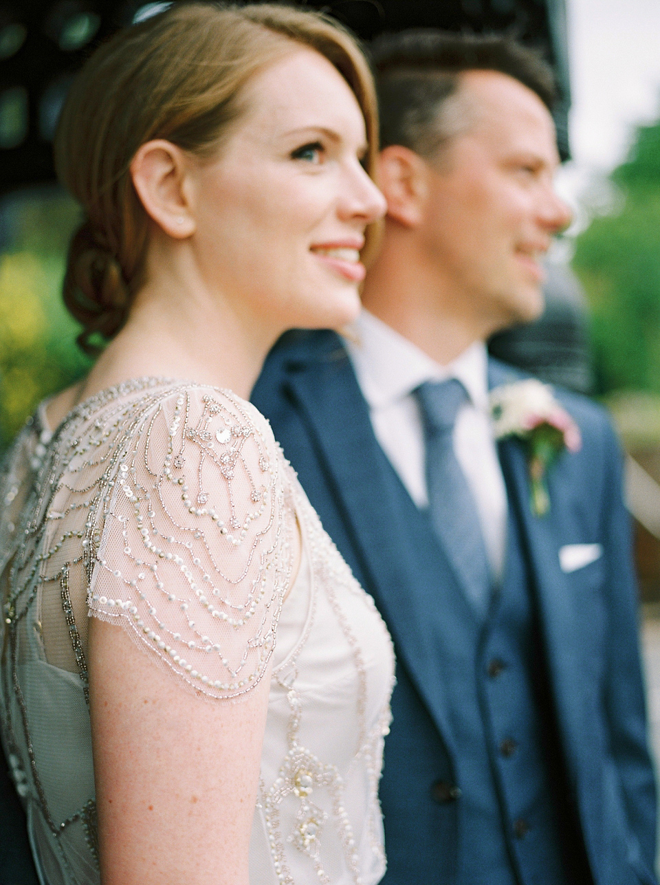 Kat wears Eden by Jenny Packham for her pretty Summer village hall wedding. Photography by Emma B.