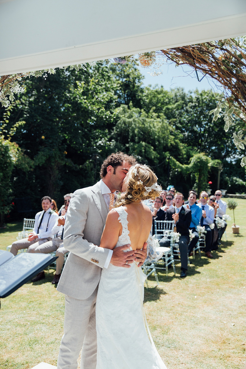 Bride Sarah wore an Essence of Australia gown and flowers in her hair for her wedding by the sea in Dorset. Photography by Charlotte Bryer Ash. Bride Sarah wore an Essence of Australia gown and flowers in her hair for her wedding by the sea in Dorset. Photography by Charlotte Bryer Ash.