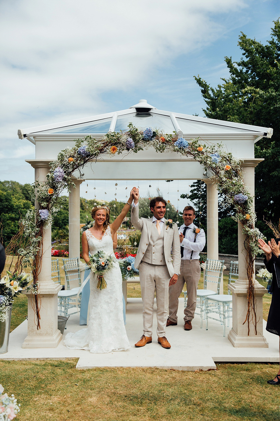 Bride Sarah wore an Essence of Australia gown and flowers in her hair for her wedding by the sea in Dorset. Photography by Charlotte Bryer Ash. Bride Sarah wore an Essence of Australia gown and flowers in her hair for her wedding by the sea in Dorset. Photography by Charlotte Bryer Ash.