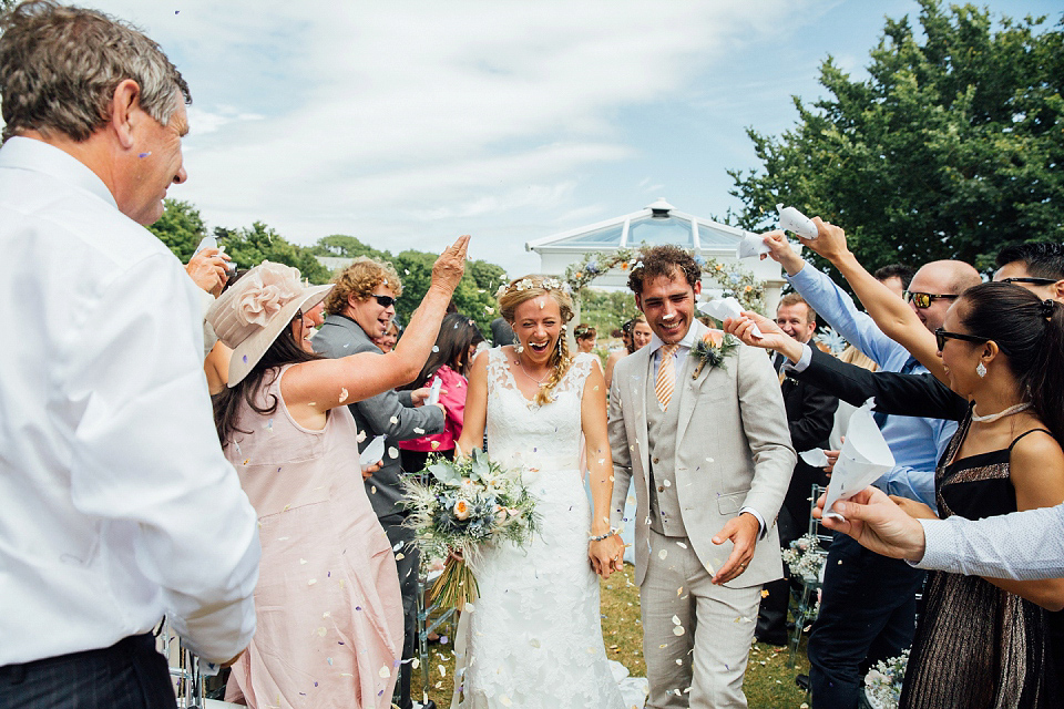 An Essence of Australia Gown and Flowers in her Hair for a Dorset Coast Wedding 7 wpid407358 beach inspired summer wedding dorset 20