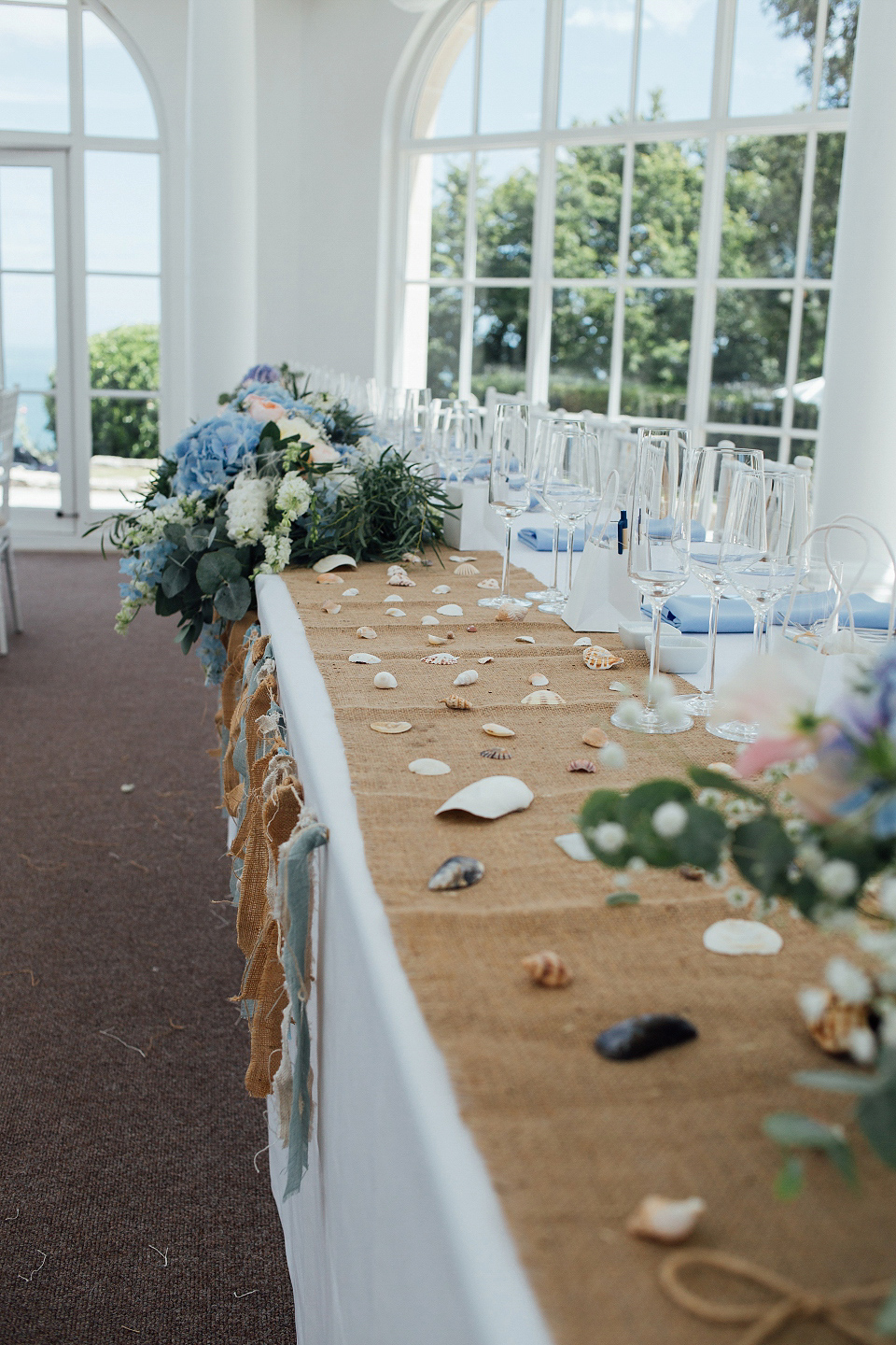 Bride Sarah wore an Essence of Australia gown and flowers in her hair for her wedding by the sea in Dorset. Photography by Charlotte Bryer Ash. Bride Sarah wore an Essence of Australia gown and flowers in her hair for her wedding by the sea in Dorset. Photography by Charlotte Bryer Ash.