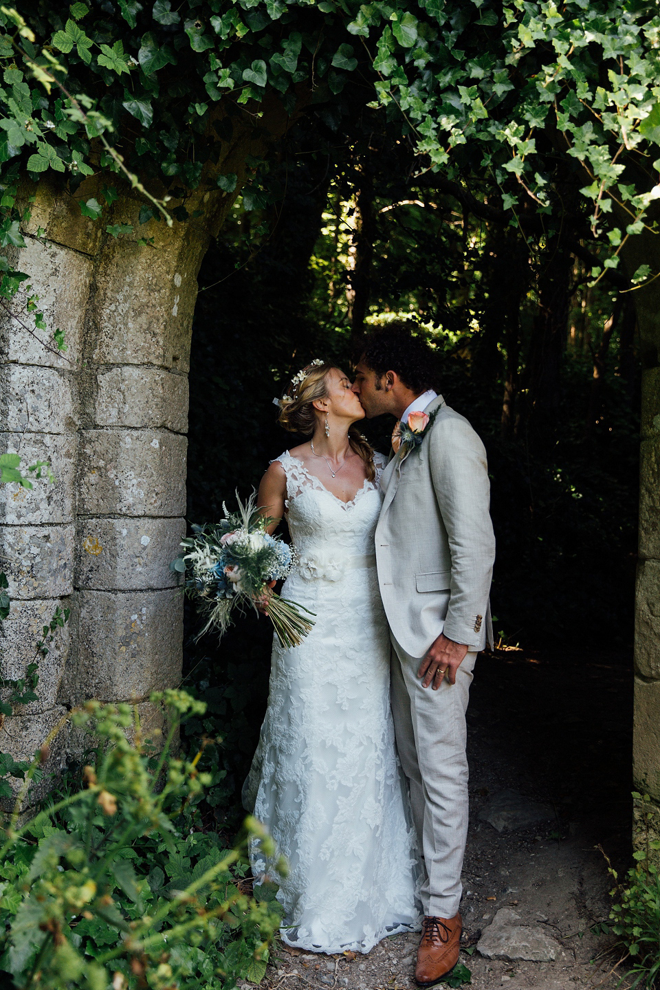 Bride Sarah wore an Essence of Australia gown and flowers in her hair for her wedding by the sea in Dorset. Photography by Charlotte Bryer Ash. Bride Sarah wore an Essence of Australia gown and flowers in her hair for her wedding by the sea in Dorset. Photography by Charlotte Bryer Ash.