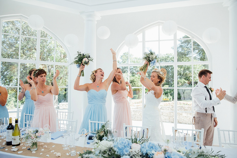 Bride Sarah wore an Essence of Australia gown and flowers in her hair for her wedding by the sea in Dorset. Photography by Charlotte Bryer Ash. Bride Sarah wore an Essence of Australia gown and flowers in her hair for her wedding by the sea in Dorset. Photography by Charlotte Bryer Ash.