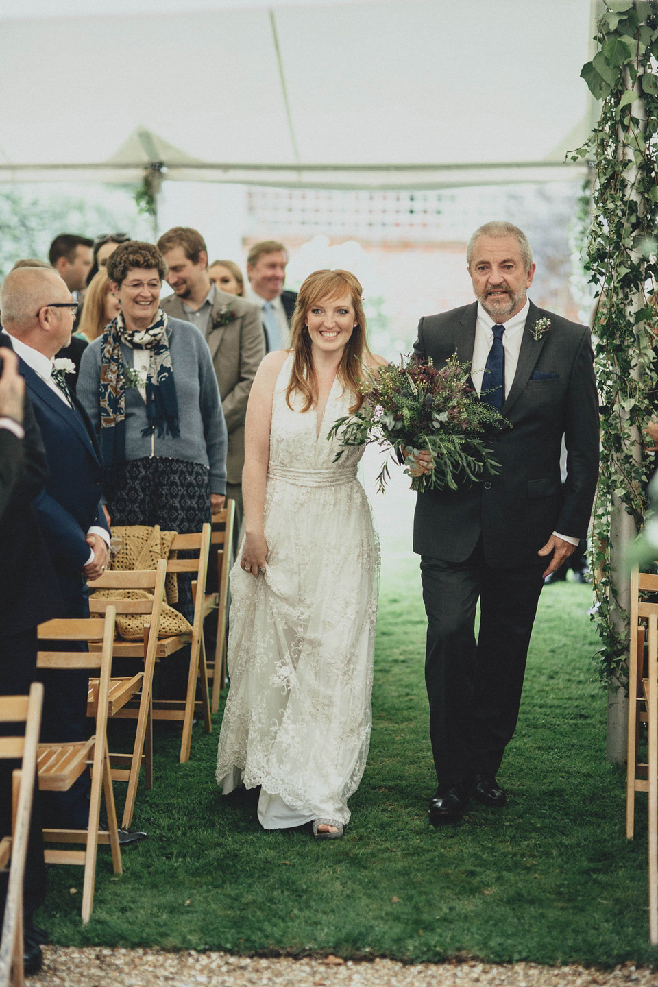 Bride Jess made her wedding dress herself. She tied the knot with Jordan in a woodland inspired wedding. Photography by Ali Paul.