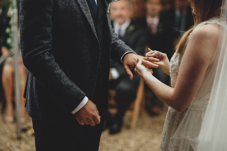 Bride Jess made her wedding dress herself. She tied the knot with Jordan in a woodland inspired wedding. Photography by Ali Paul.