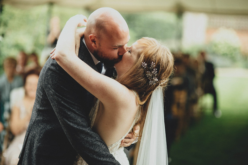 Bride Jess made her wedding dress herself. She tied the knot with Jordan in a woodland inspired wedding. Photography by Ali Paul.