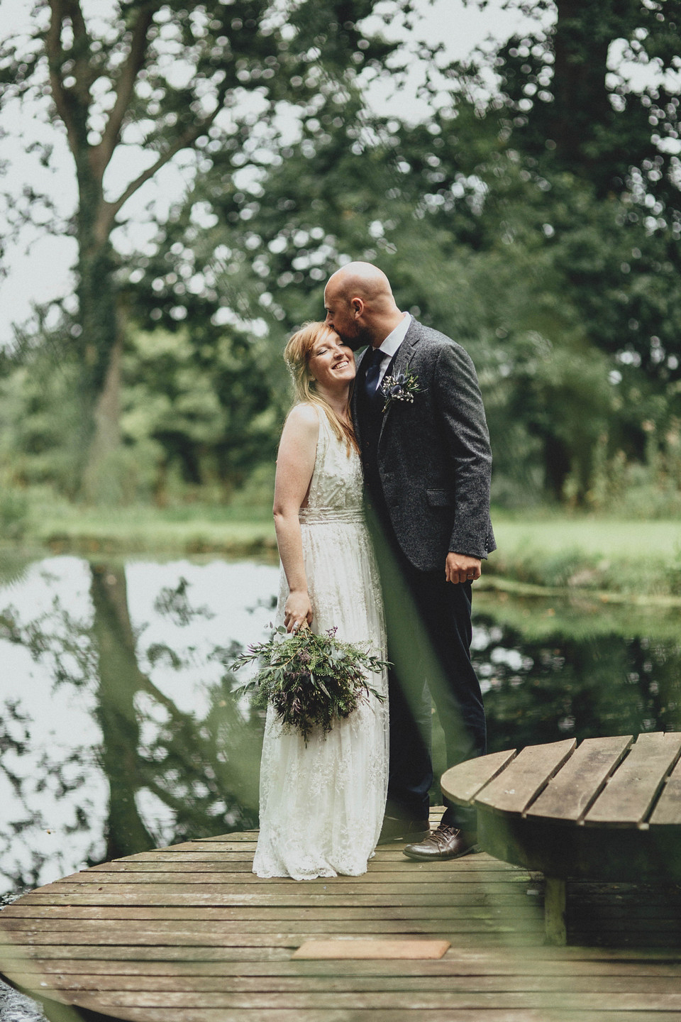 Bride Jess made her wedding dress herself. She tied the knot with Jordan in a woodland inspired wedding. Photography by Ali Paul.