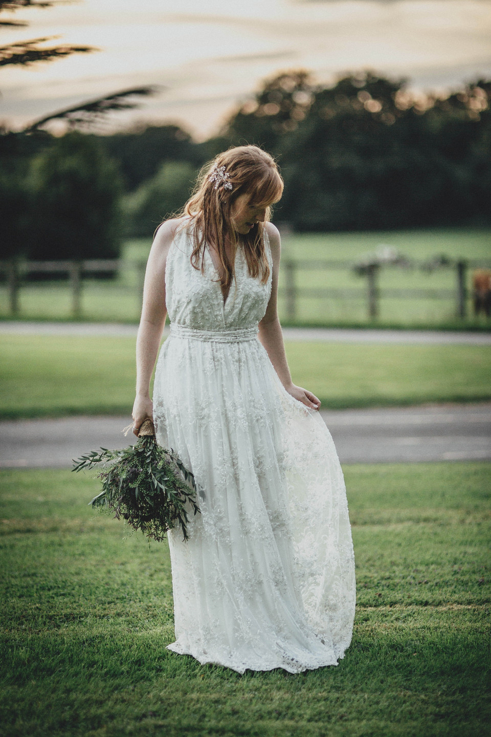 Bride Jess made her wedding dress herself. She tied the knot with Jordan in a woodland inspired wedding. Photography by Ali Paul.