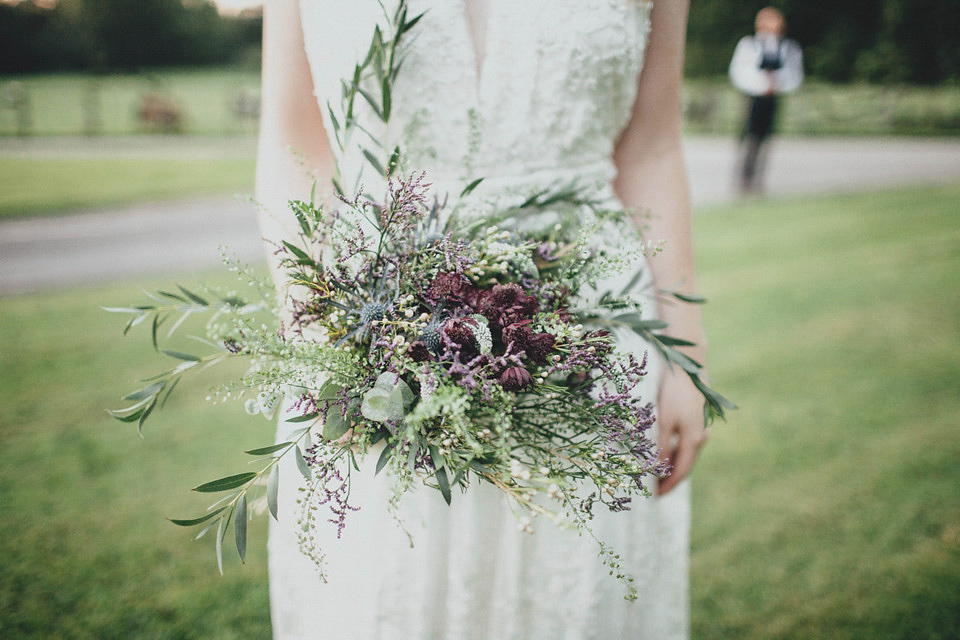 Bride Jess made her wedding dress herself. She tied the knot with Jordan in a woodland inspired wedding. Photography by Ali Paul.