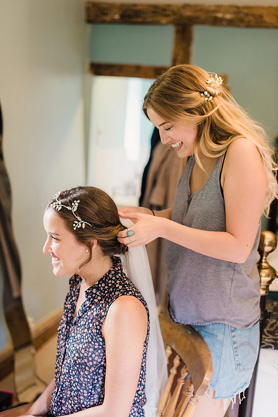 Bride Daisy wore a Stella York gown for her pale blue and flower filled Summer wedding in the English countryside. Photography by Faye Cornhill.