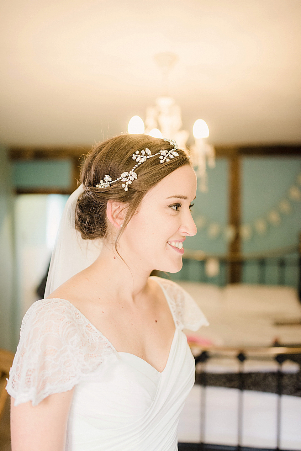 Bride Daisy wore a Stella York gown for her pale blue and flower filled Summer wedding in the English countryside. Photography by Faye Cornhill.