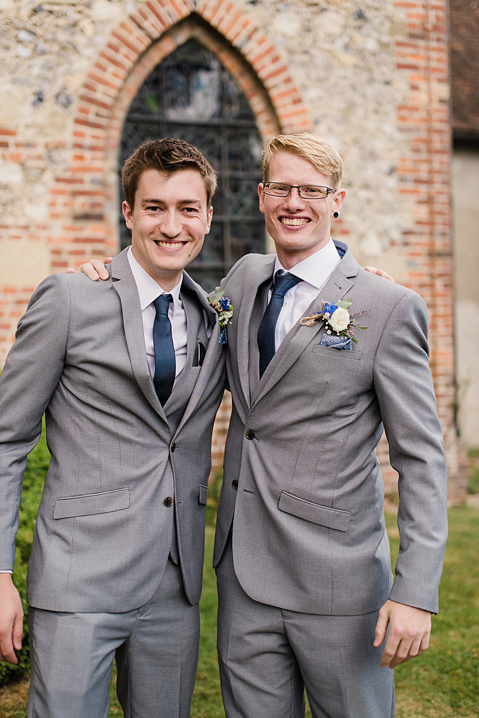 Bride Daisy wore a Stella York gown for her pale blue and flower filled Summer wedding in the English countryside. Photography by Faye Cornhill.