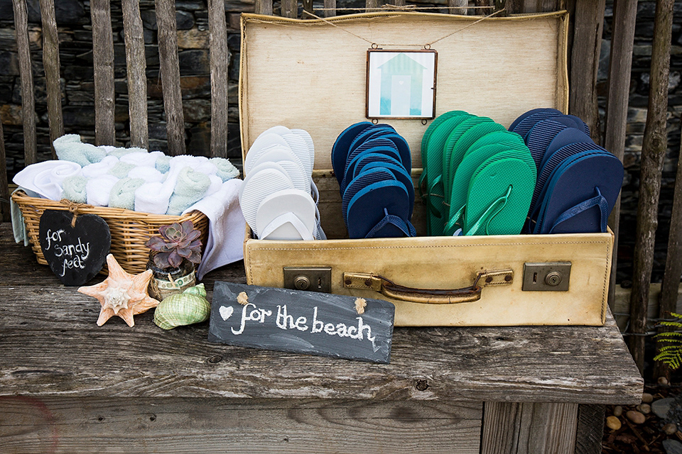 Bride Louisa wears a polka dot gown by Cathrine Deane for her seaside wedding in Devon.